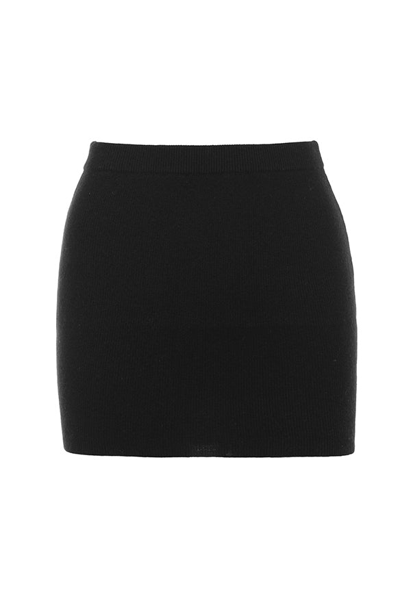 Black cardigan with faux fur trim and cashmere mini skirt