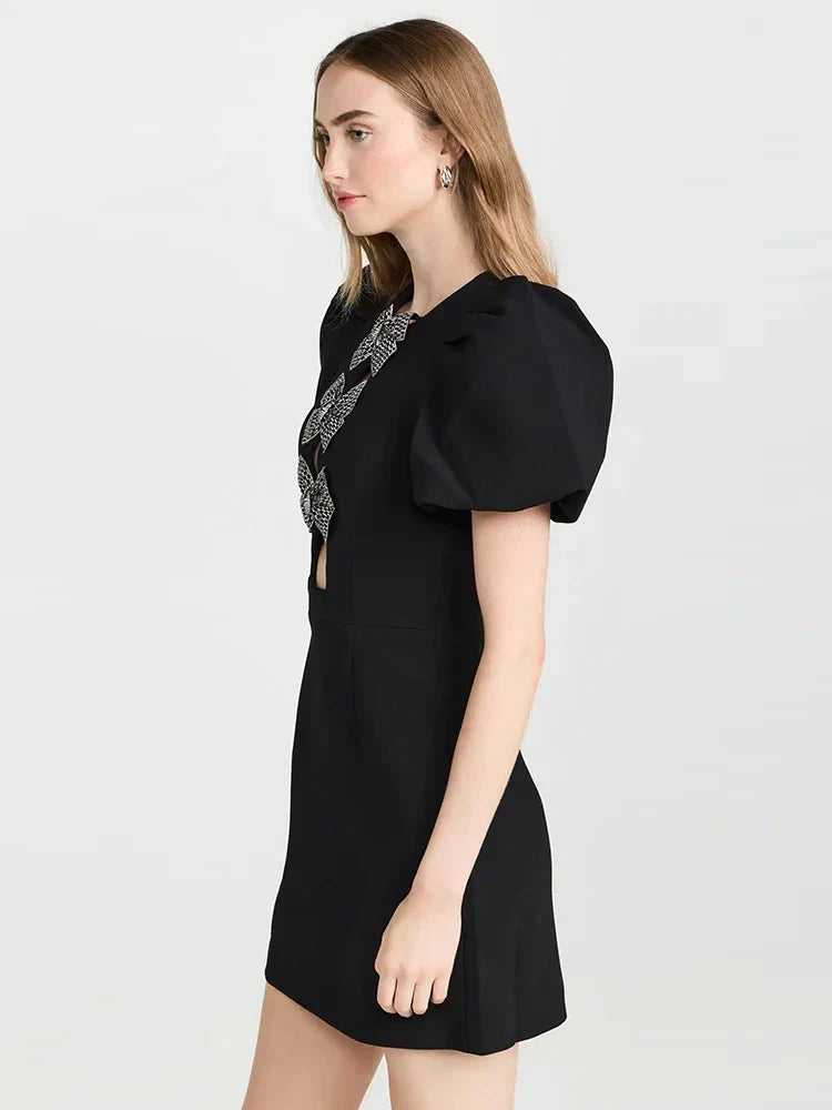 Black dress with three bows