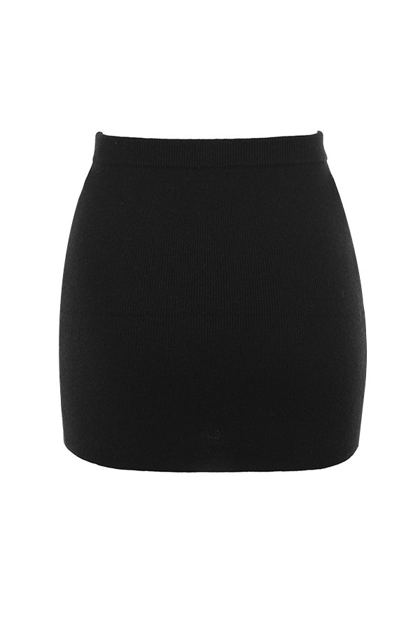 Black cardigan with faux fur trim and cashmere mini skirt