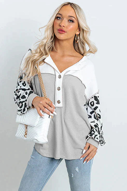 Patchwork waffle knit top with leopard sleeves