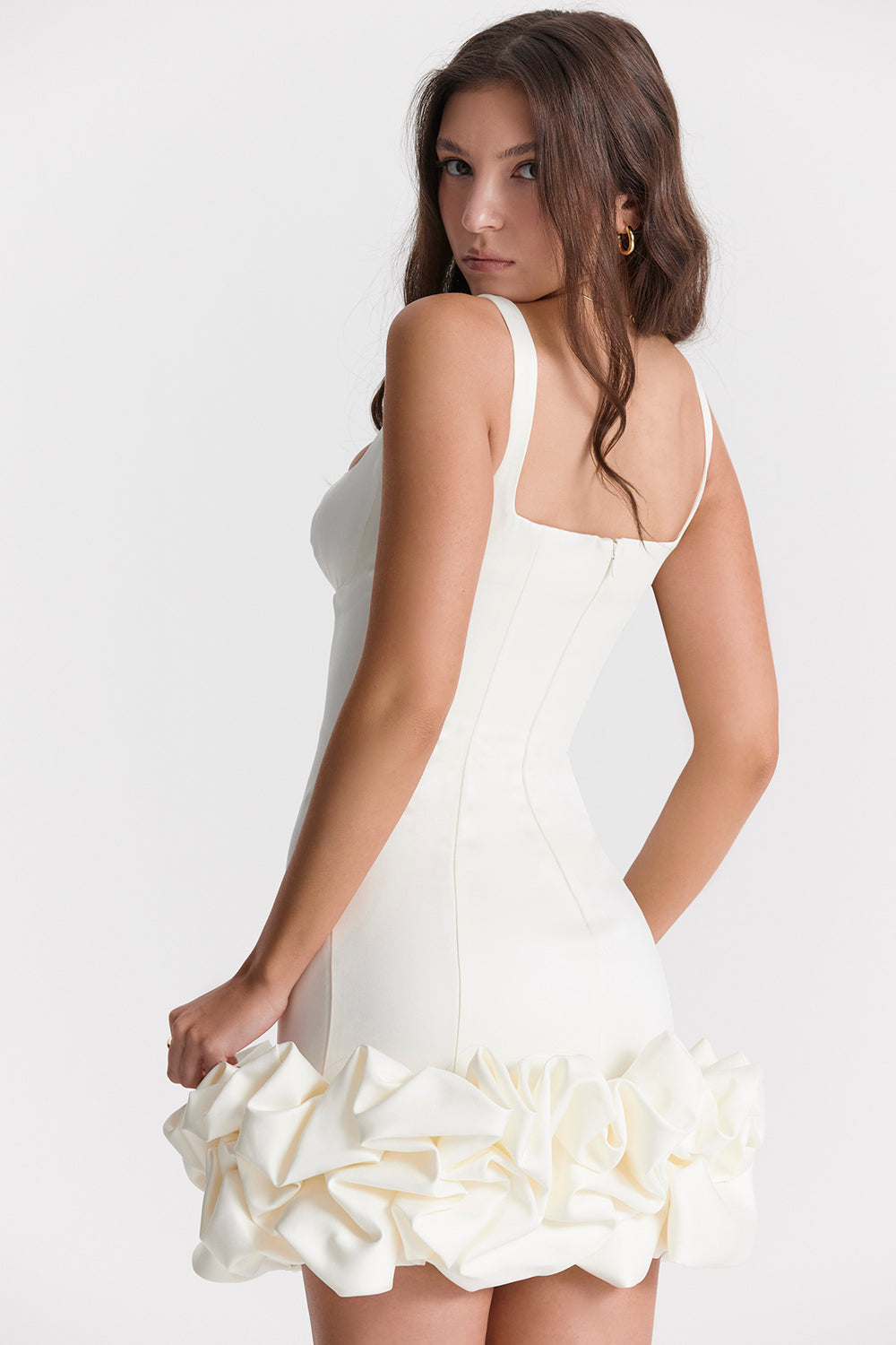 Black dress with ruffles at the hem