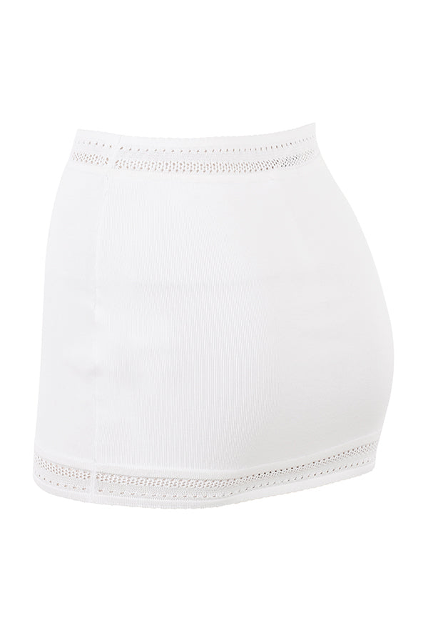 Ivory colored elegant rib knitted top with mini skirt