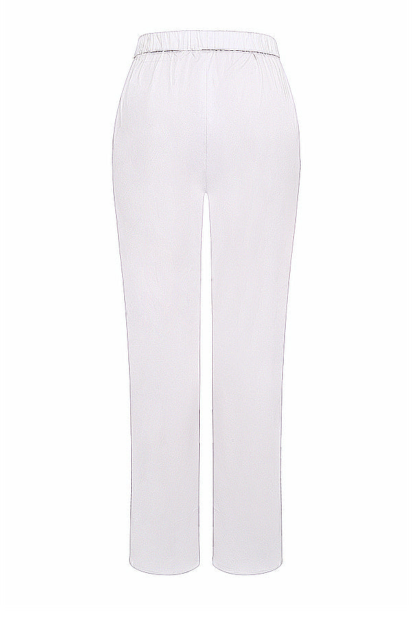 White oversized shirt with relaxed fit trousers